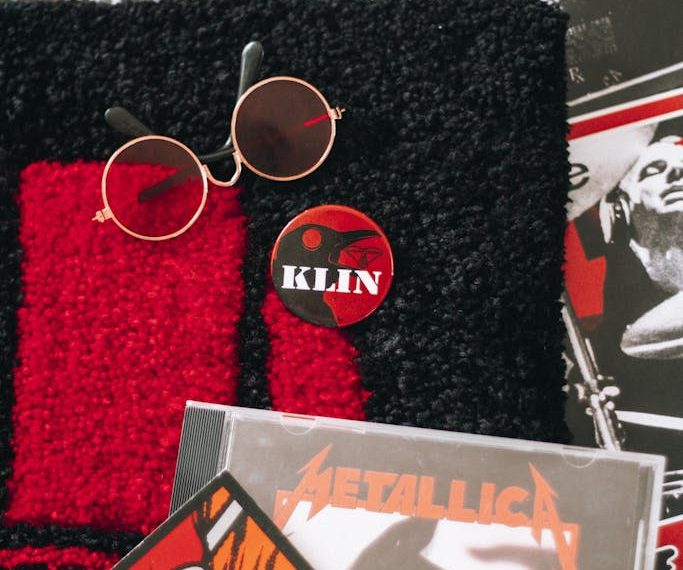 Sunglasses, Pin and Metallica Album