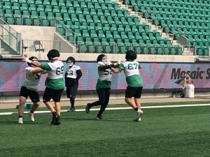 “I think we’re growing confident as a group.” OT Eric Lofton one element of a resurgent Roughriders offensive line