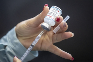 Amid vaccine fatigue, doctors say the updated COVID-19 shot is important this fall