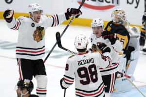 Bedard earns assist in NHL debut as Blackhawks beat Crosby, Penguins 4-2