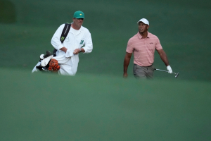 Tiger Woods, others back on the course at the Masters to begin long day chasing Bryson DeChambeau