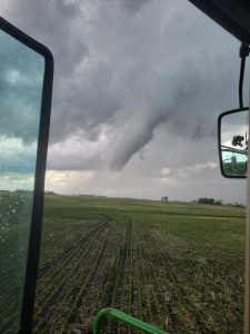 Hail, Funnel Clouds, & Rainbows on the Prairies yesterday!