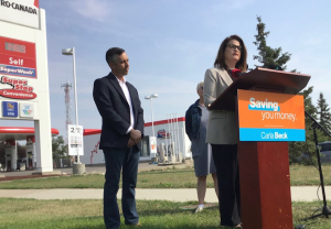 NDP commits to suspend 15-cent a litre gas tax on day one if elected