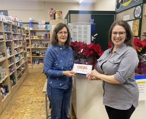 Preeceville’s “Filling the Gap” receives donation from GX94’s “Christmas Goodies” cookbook