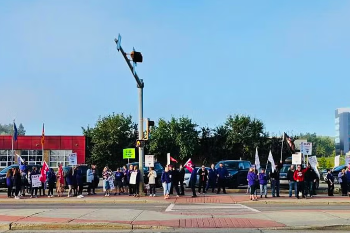 CUPE members gather amid ongoing labour dispute with school divisions.