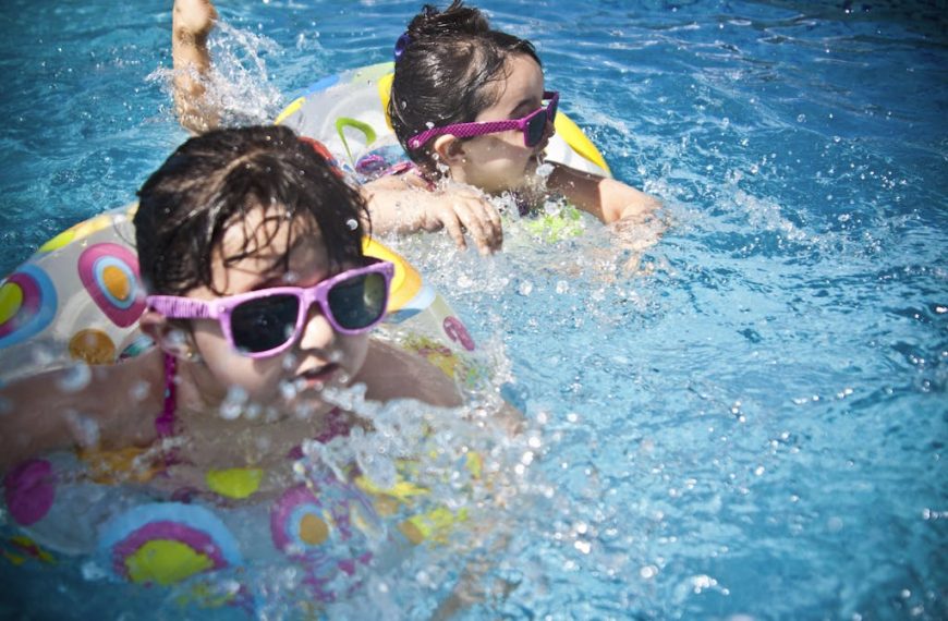 2 Girl's Swimming during Daytime