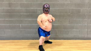 Giant Jim promoting up coming wrestling Show in Edmonton.