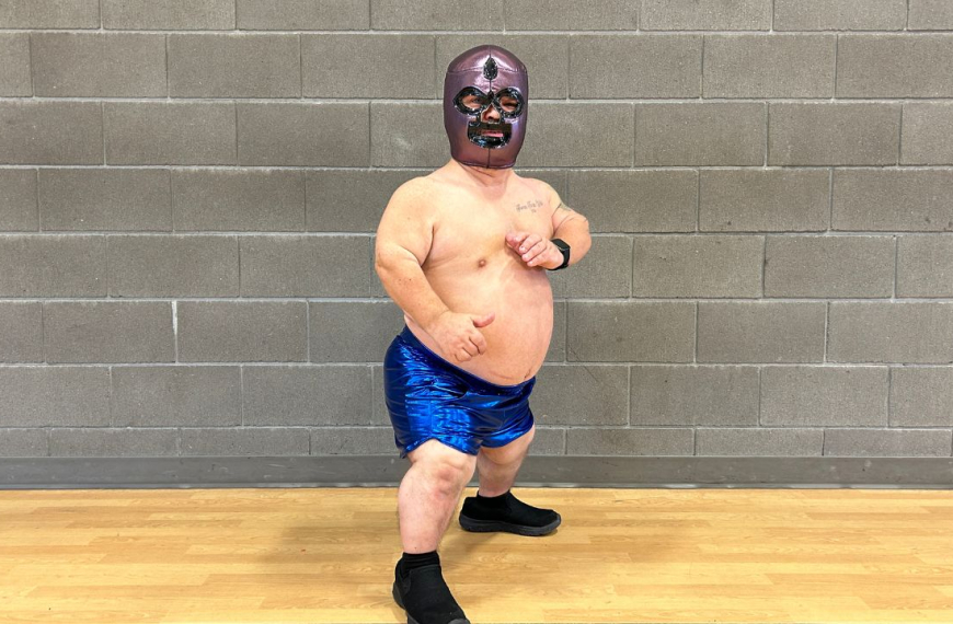 Giant Jim promoting up coming wrestling Show in Edmonton.